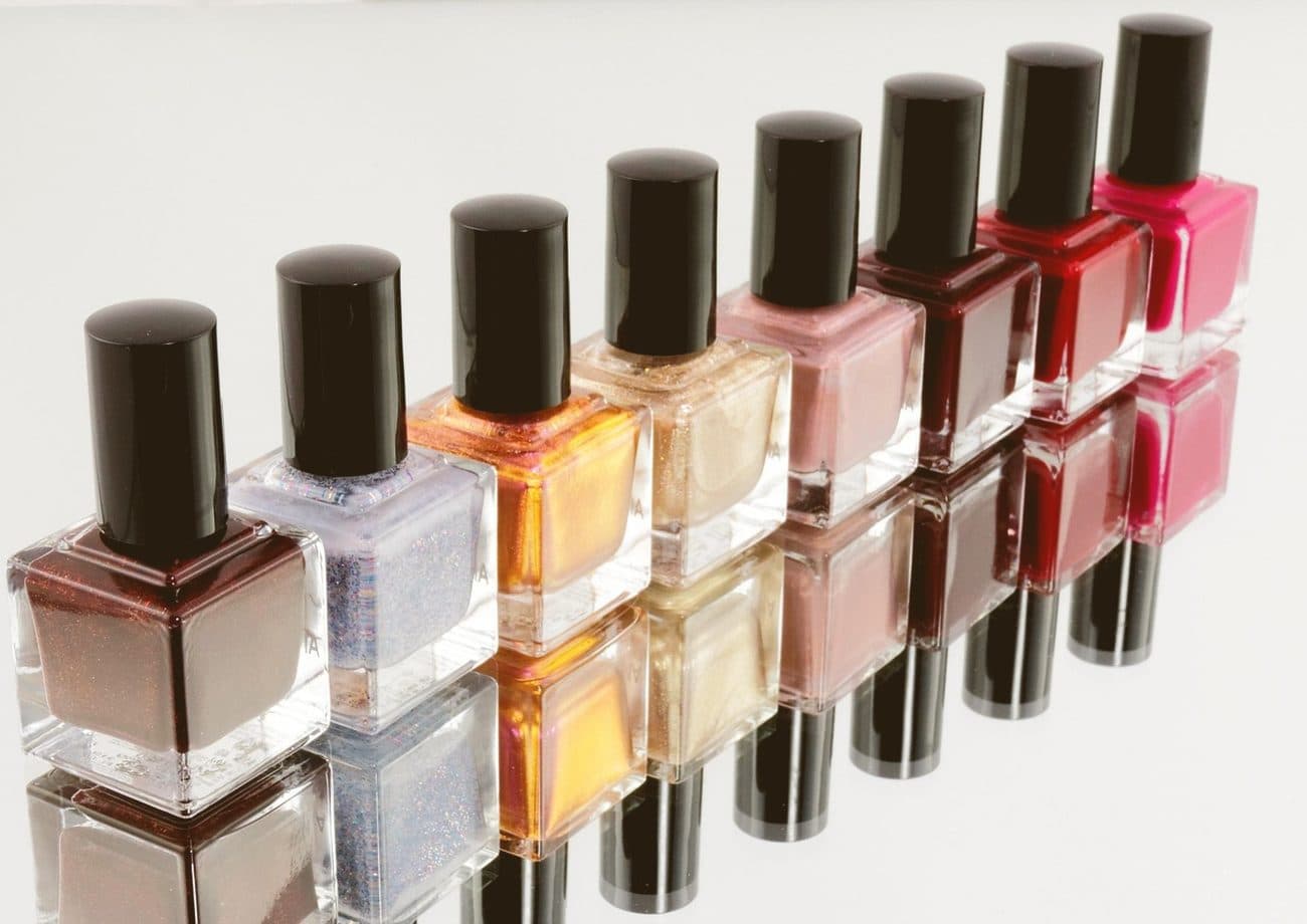 Cosmetic bottles arranged in a graded row