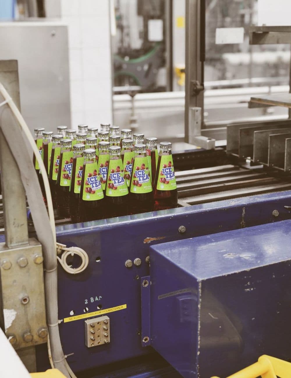 Bottles moving along a beverage line